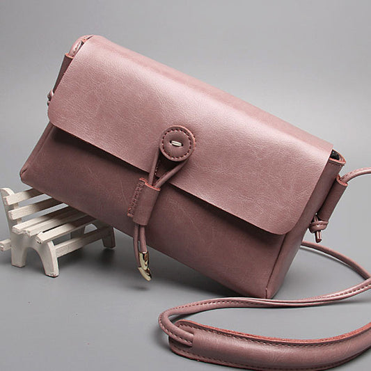 Leather bag bag buttons Korea 2015 new fashion shoulder bag ladies bags wholesale cross retro trend