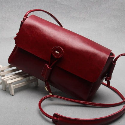 Leather bag bag buttons Korea 2015 new fashion shoulder bag ladies bags wholesale cross retro trend