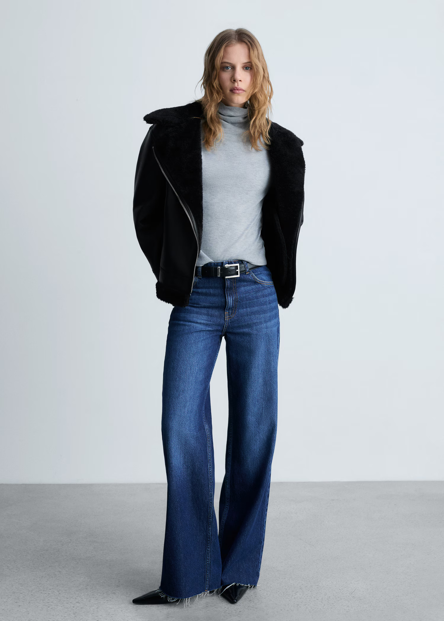 Stylish leather jacket with black fur sheepskin leather coat for women